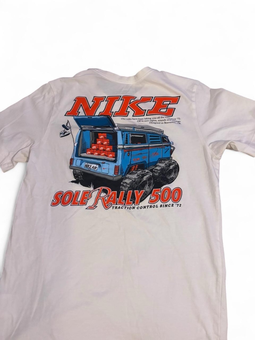 Nike White Graphic Tee with Red and Blue Rally Print